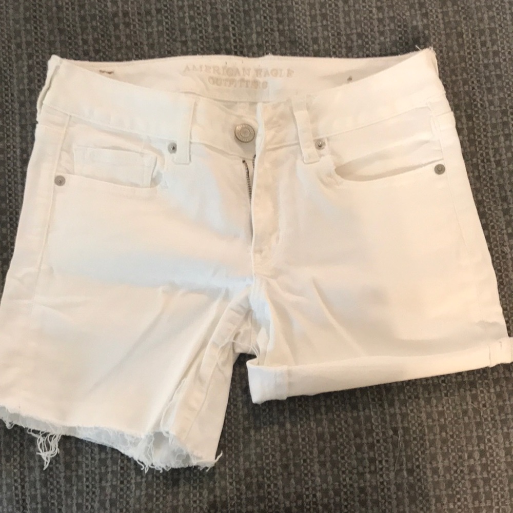 White roll up jean shorts.